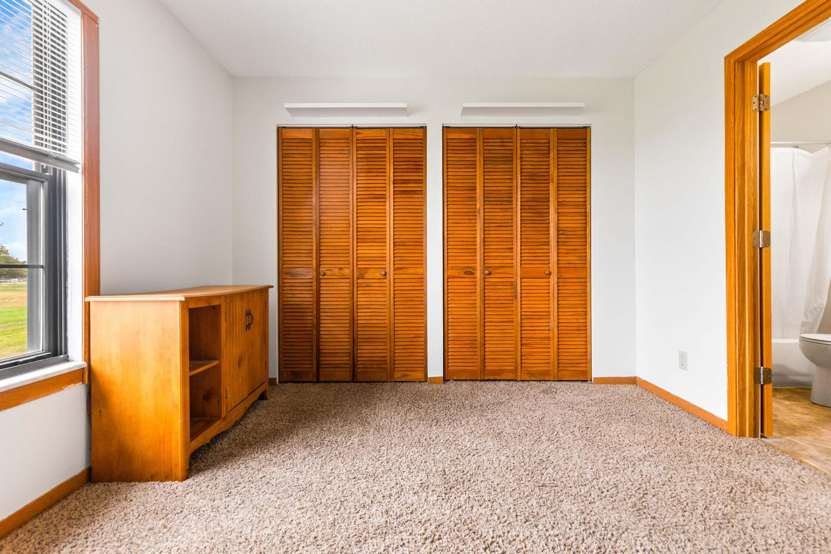 700 North Adelaide Street, Unit 12 Normal, IL 61761 - Photo 9 of 16 a view of an empty room with a window