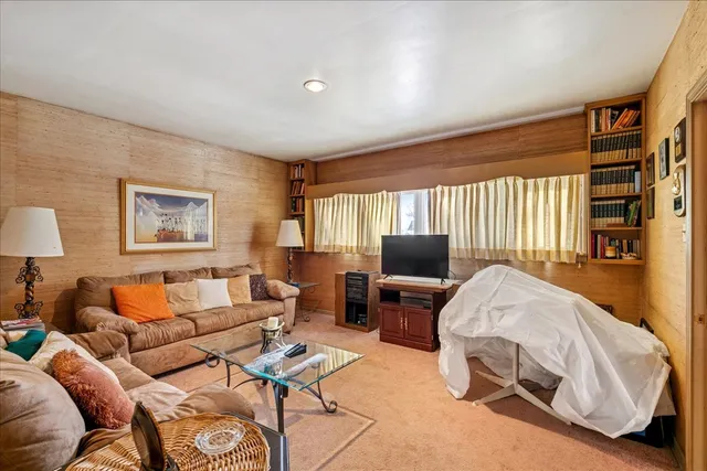 a bedroom with a bed and a walk in closet