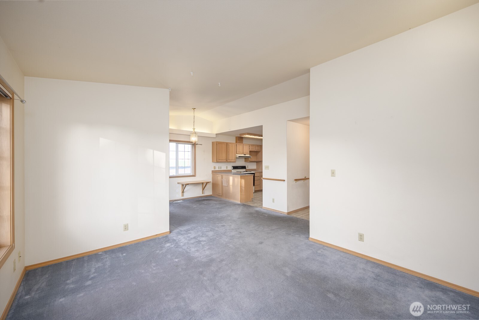 1000 13th Avenue Southwest, Unit 3 Quincy, WA 98848 - Photo 15 of 38 a view of a kitchen with furniture and an empty room