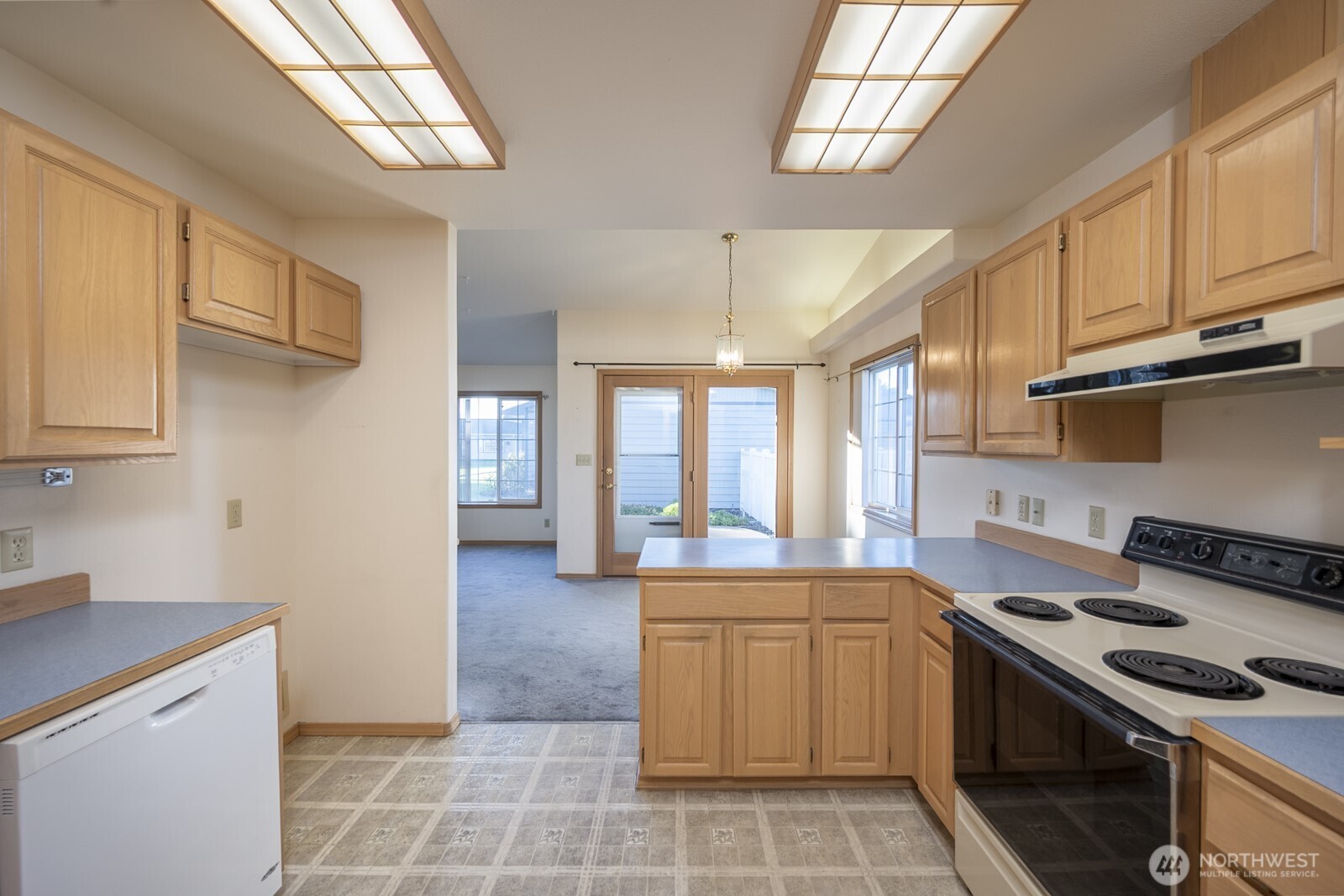 1000 13th Avenue Southwest, Unit 3 Quincy, WA 98848 - Photo 27 of 38 a kitchen that has a sink and a stove