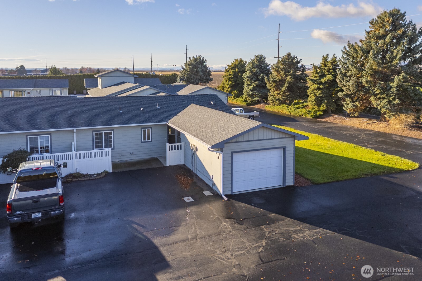 1000 13th Avenue Southwest, Unit 3 Quincy, WA 98848 - Photo 3 of 38 a view of a house with a yard