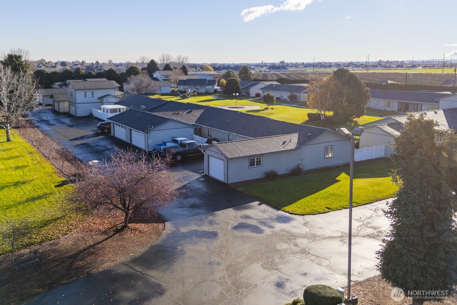 1000 13th Avenue Southwest, Unit 3 Quincy, WA 98848 - Photo 35 of 38 a view of a swimming pool with a lounge chairs