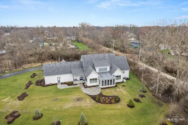 an aerial view of a house with a garden