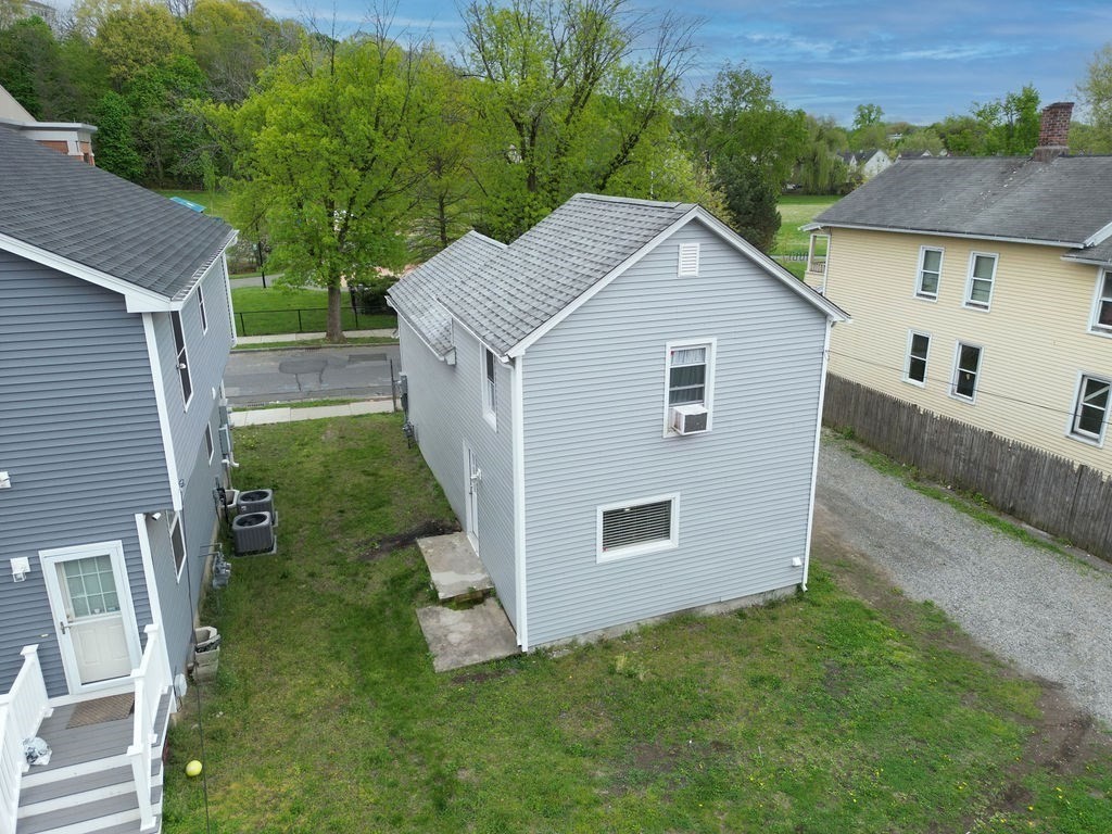 76 Marble Street Springfield, MA 01105 - Photo 3 of 27 a view of a house with a yard