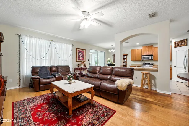 an empty room with a empty space and windows