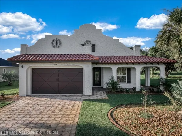 $395,000 | 7066 Strafford Oaks Drive, Sebring, FL 33875