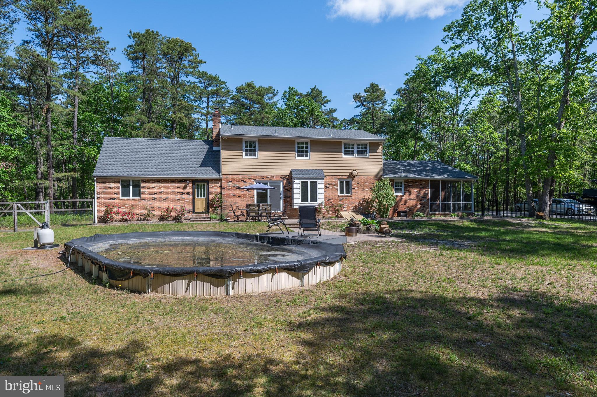 16 Sawmill Road Medford, NJ 08055 - Photo 31 of 37 a front view of a house with garden