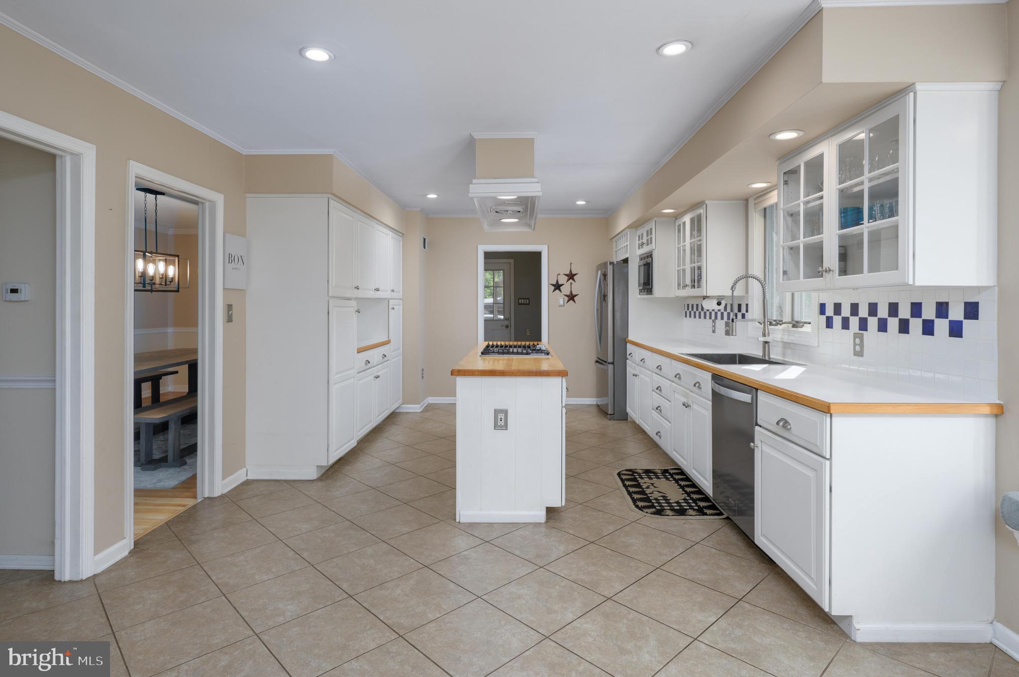 16 Sawmill Road Medford, NJ 08055 - Photo 8 of 37 a large white kitchen with a lot of counter space and refrigerator