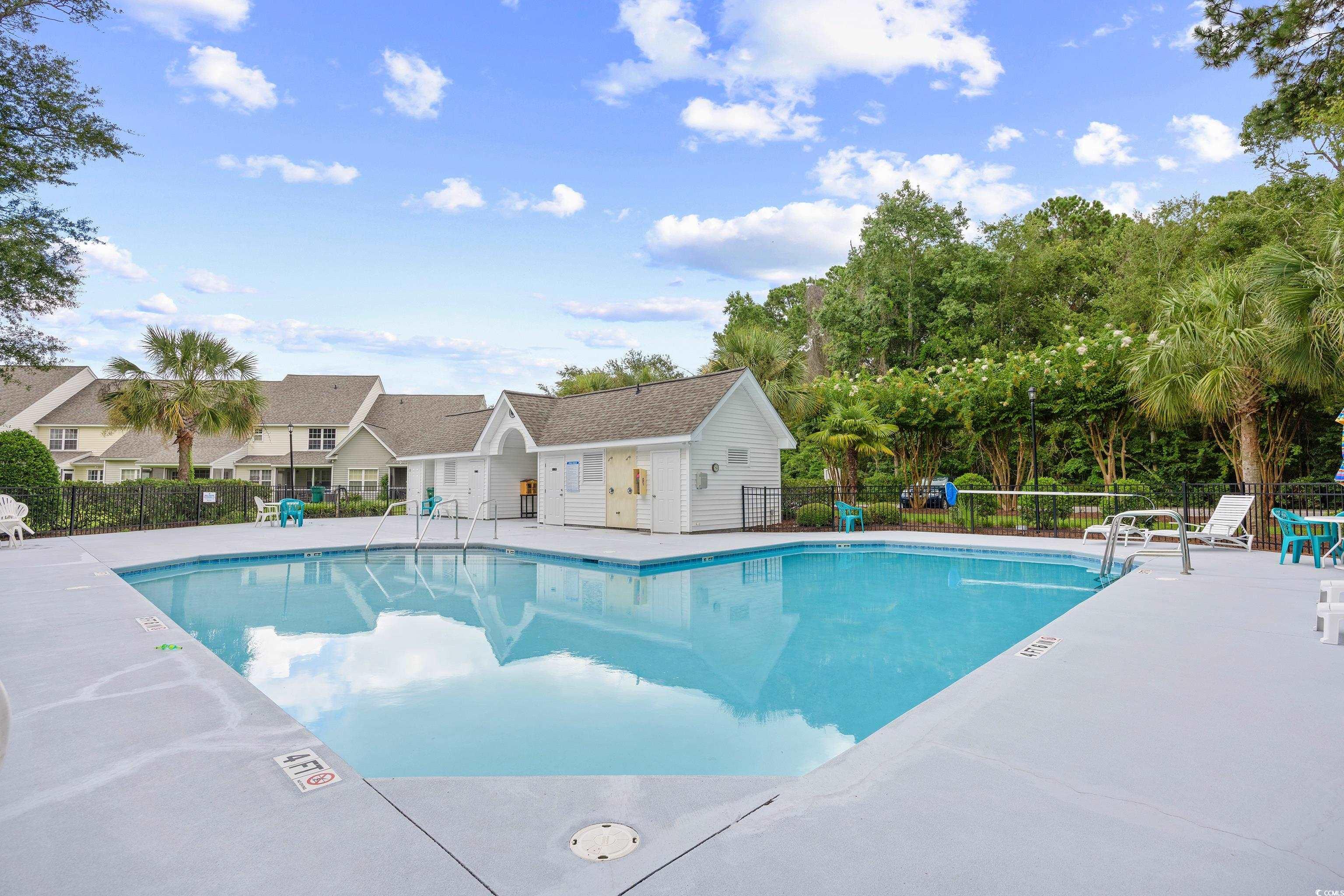 12-2 Rapture Court, Unit 2 Pawleys Island, SC 29585 - Photo 40 of 40 Community pool featuring a residential view and a