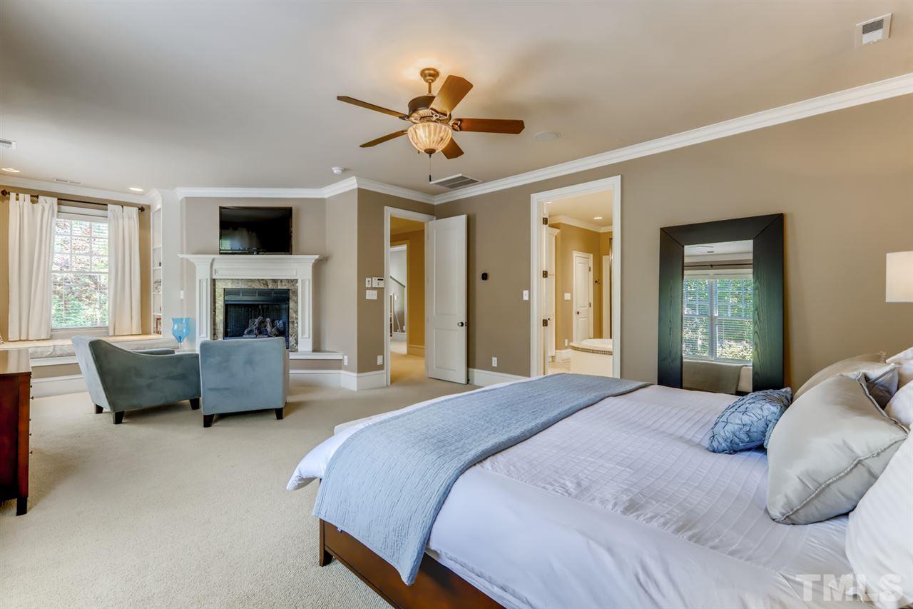 2646 Davis Street Raleigh, NC 27608 - Photo 14 of 30 Spacious suite features sitting room and charming fireplace. Ideal retreat after a long day!