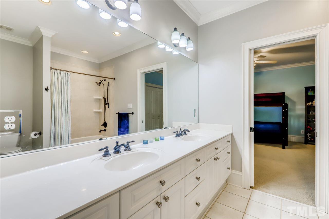 2646 Davis Street Raleigh, NC 27608 - Photo 19 of 30 Convenient bath keeps the peace with double sink vanity!