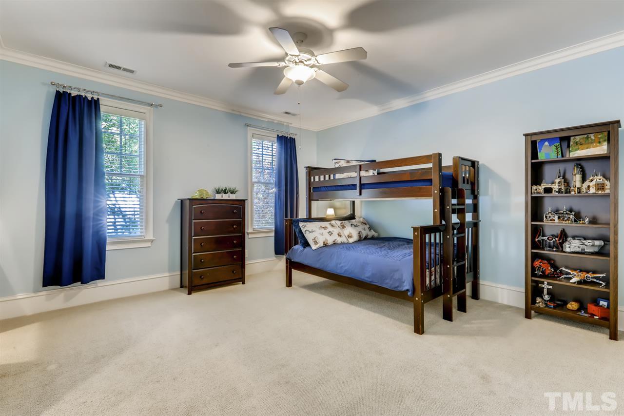 2646 Davis Street Raleigh, NC 27608 - Photo 20 of 30 Generous sized bedroom offers plush carpeting, ceiling fan and plenty of natural light.