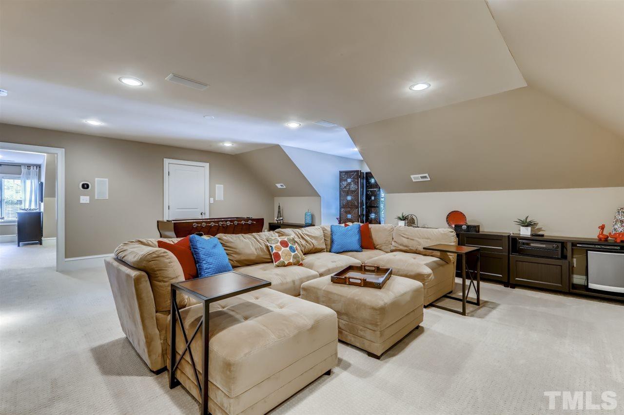 2646 Davis Street Raleigh, NC 27608 - Photo 22 of 30 Versatile space offers endless possibilities - media room, game room, or combo of both.