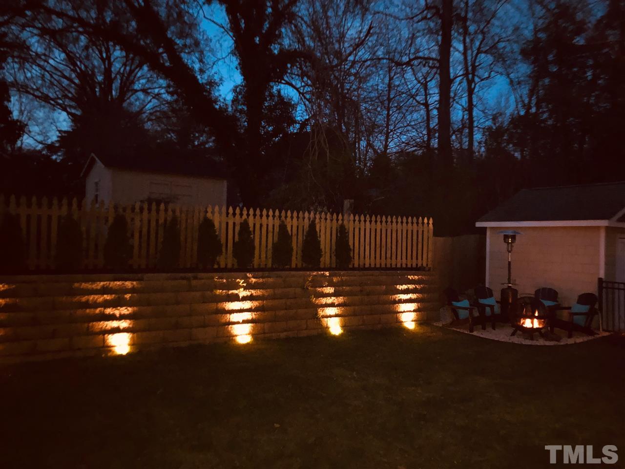 2646 Davis Street Raleigh, NC 27608 - Photo 30 of 30 Attractive lighting creates a lovely atmosphere to enjoy an outdoor evening with friends.