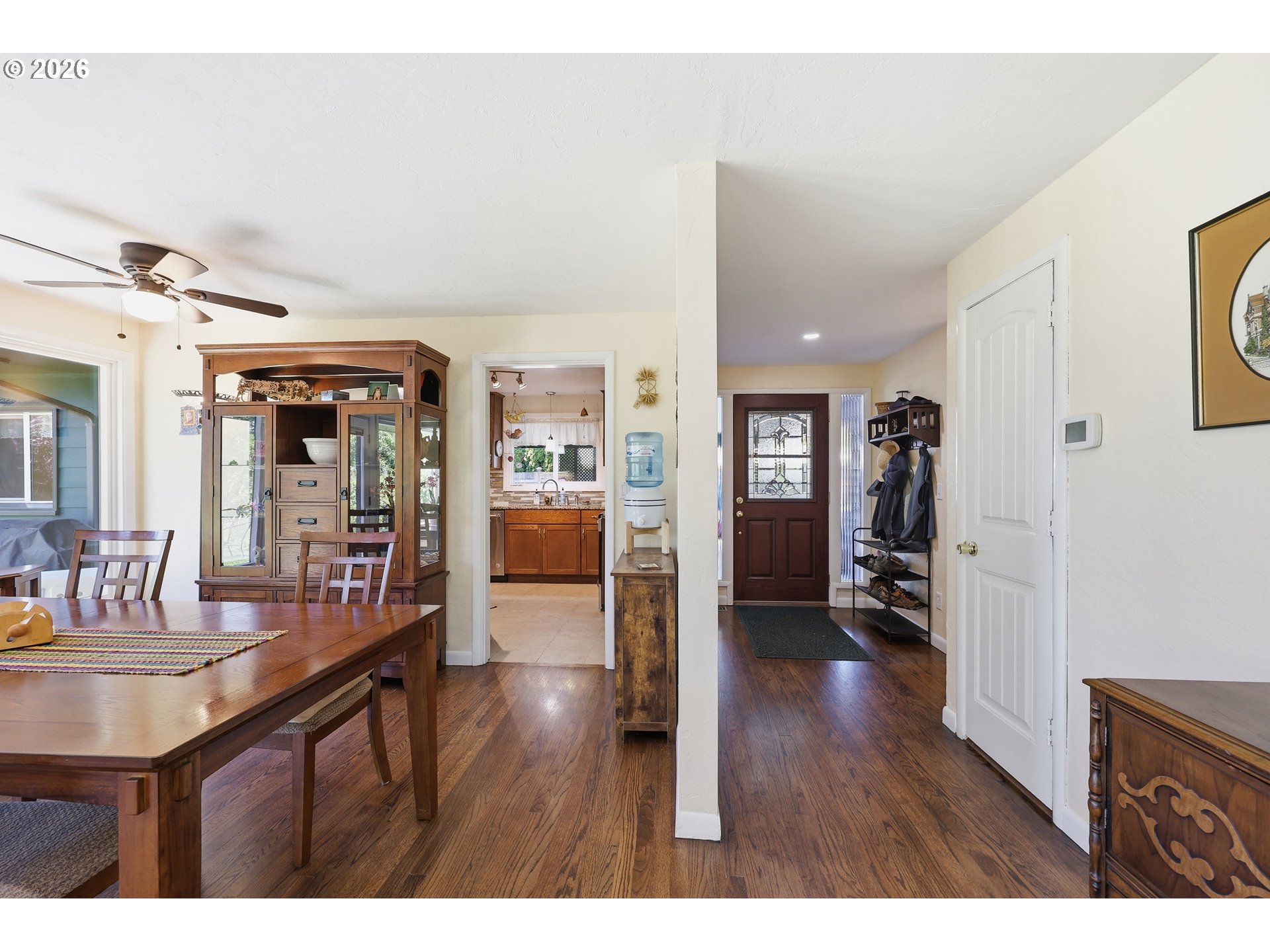 65 Greenvale Drive Springfield, OR 97477 - Photo 11 of 42 a living room with furniture and wooden floor