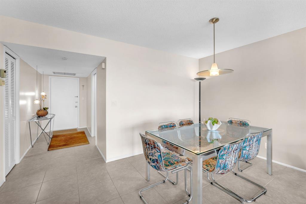 605 Oaks Drive, Unit 907 Pompano Beach, FL 33069 - Photo 14 of 41 a view of a room with gym equipment