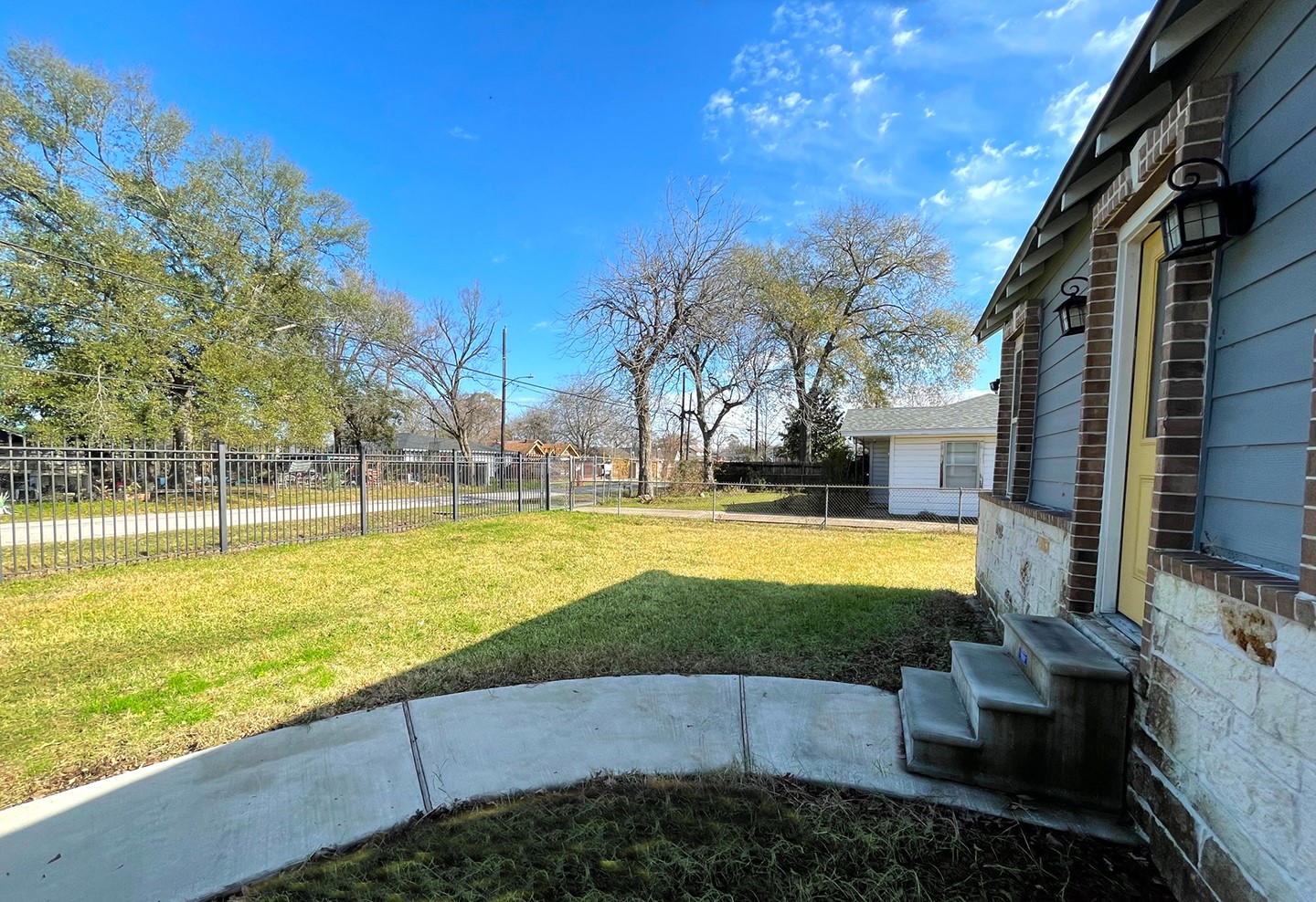720 Caperton Street Houston, TX 77022 - Photo 4 of 25 a view of yard with swimming pool and outdoor seating