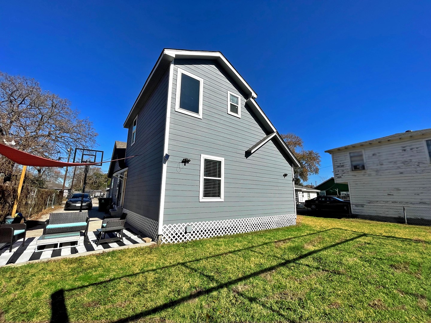 720 Caperton Street Houston, TX 77022 - Photo 5 of 25 a backyard of a house with lots of green space