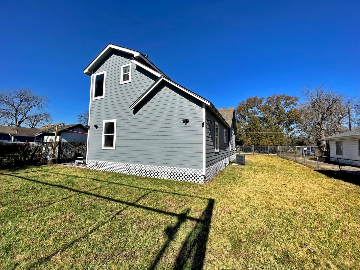 720 Caperton Street Houston, TX 77022 - Photo 6 of 25 a view of a house with a yard