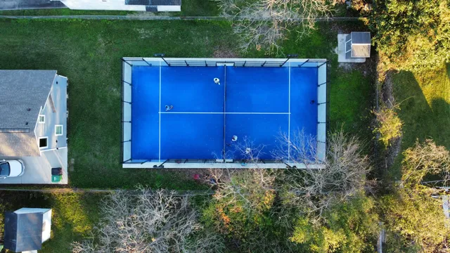 a view of a back yard of the house