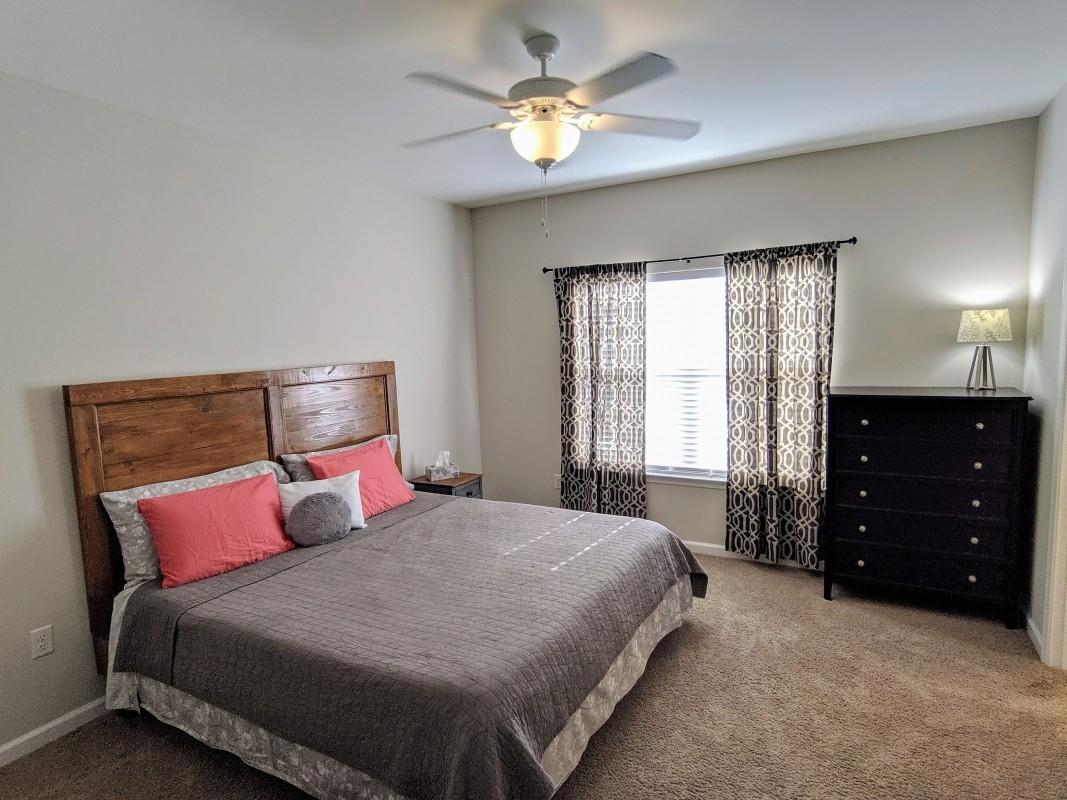 116 Matt Boulevard Niceville, FL 32578 - Photo 4 of 6 a bedroom with a bed and window