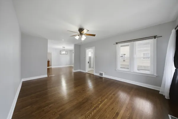 a kitchen with stainless steel appliances granite countertop a refrigerator stove and sink