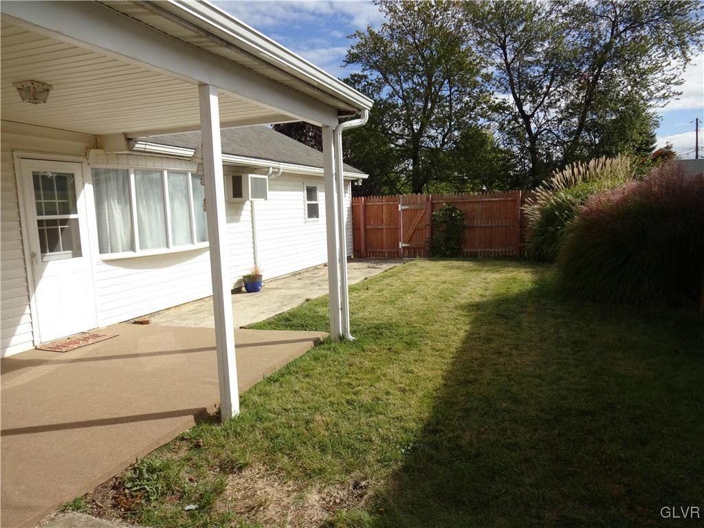 2325 Stonehenge Road Bethlehem, PA 18018 - Photo 4 of 14 a view of a house with backyard and a tree