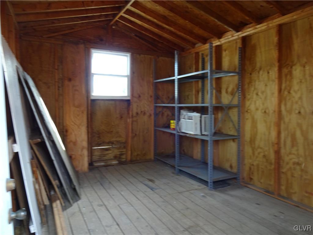 2325 Stonehenge Road Bethlehem, PA 18018 - Photo 7 of 14 a view of an empty room with wooden floor and stairs