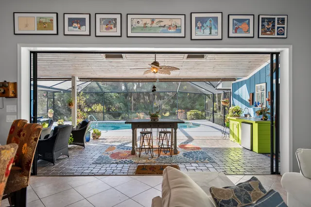 a outdoor space with patio the couches and a potted plant on the wall