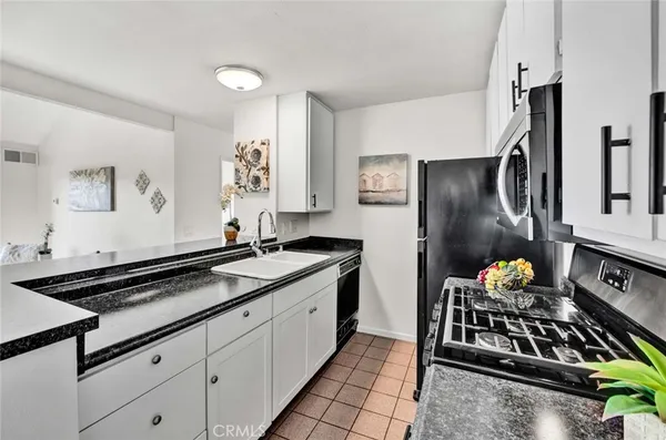 $382,000 | 15237 Santa Gertrudes Avenue, Unit U201, La Mirada, CA 90638