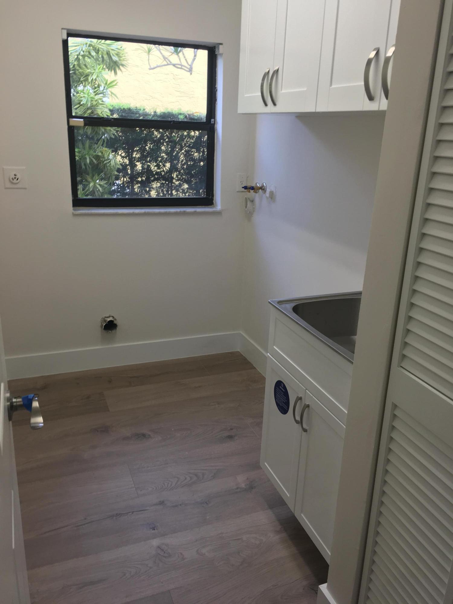 23204 L'Ermitage Circle Boca Raton, FL 33433 - Photo 17 of 49 LAUNDRY ROOM