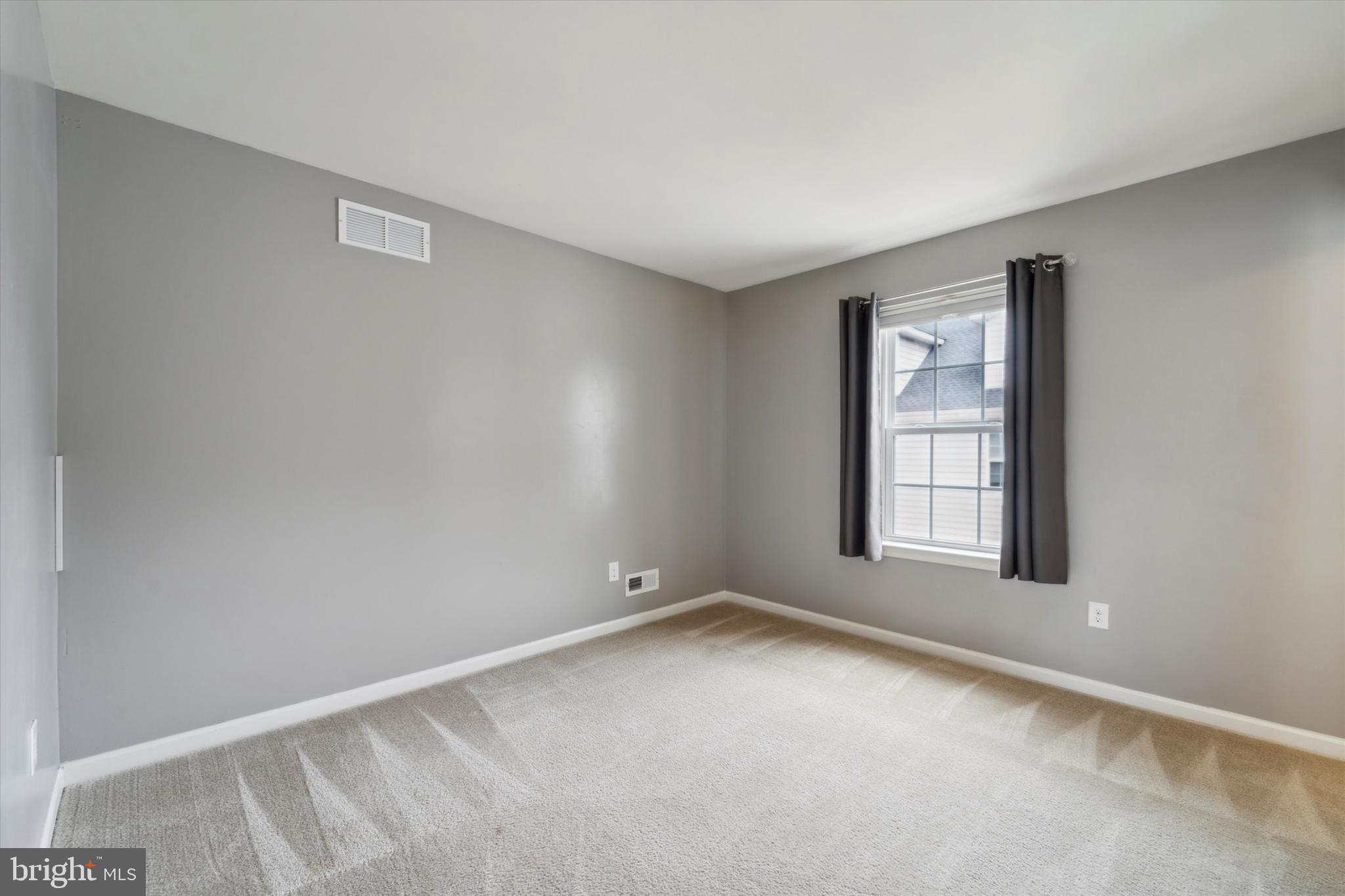 3799 Jacob Stout Road, Unit 5 Doylestown, PA 18902 - Photo 13 of 25 an empty room with windows