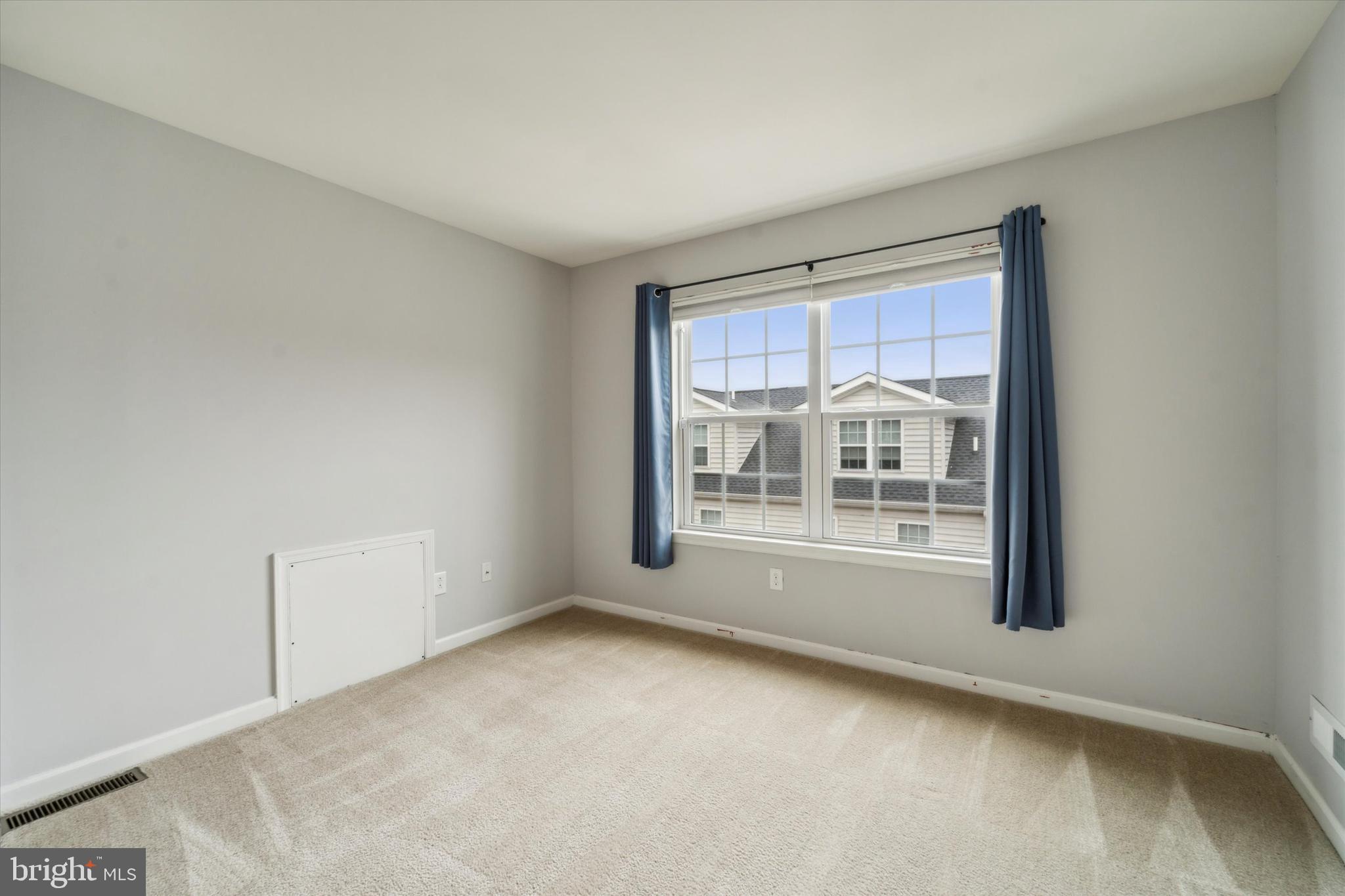 3799 Jacob Stout Road, Unit 5 Doylestown, PA 18902 - Photo 16 of 25 an empty room with a window