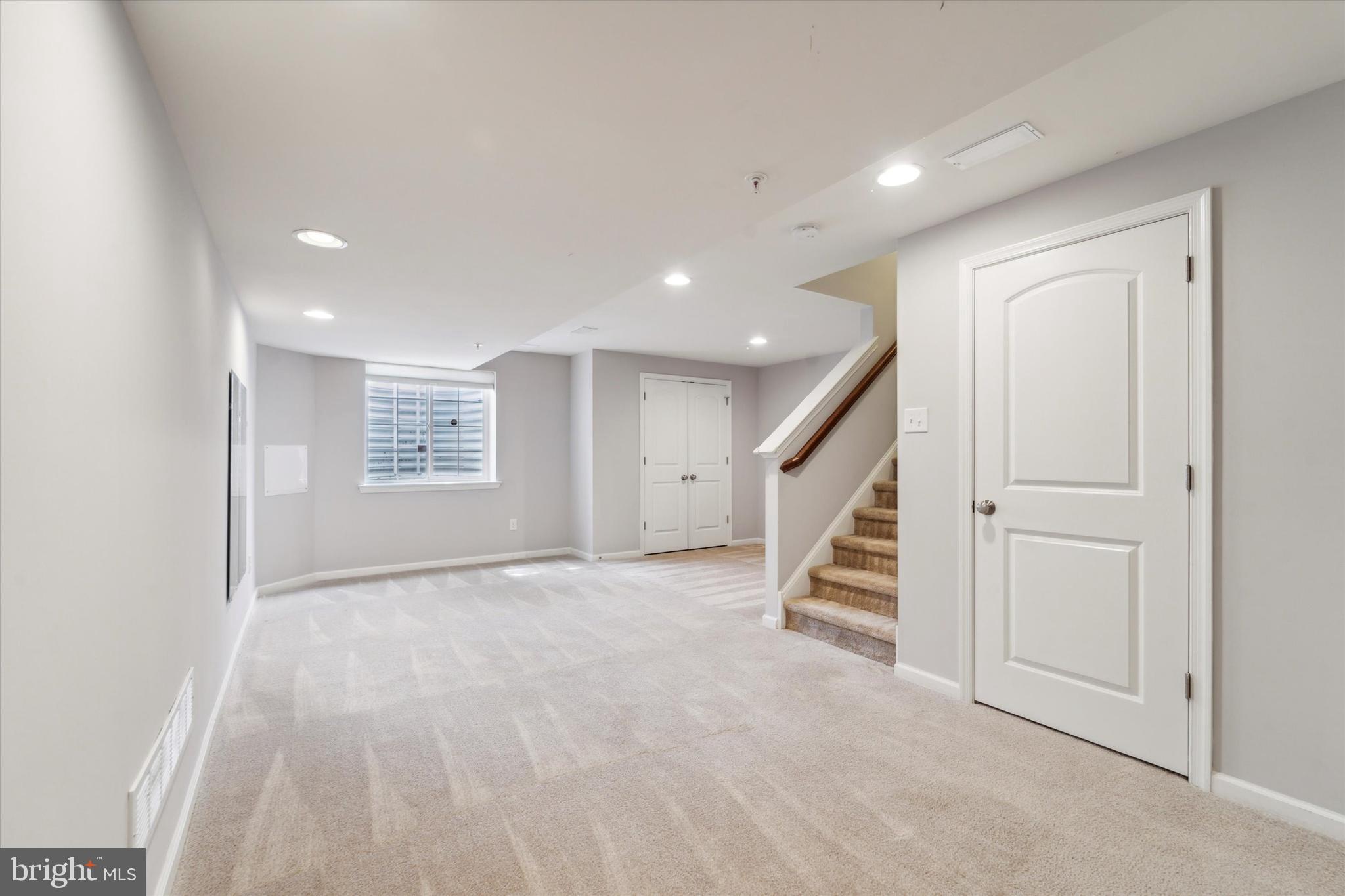 3799 Jacob Stout Road, Unit 5 Doylestown, PA 18902 - Photo 19 of 25 a view of an empty room with a fireplace