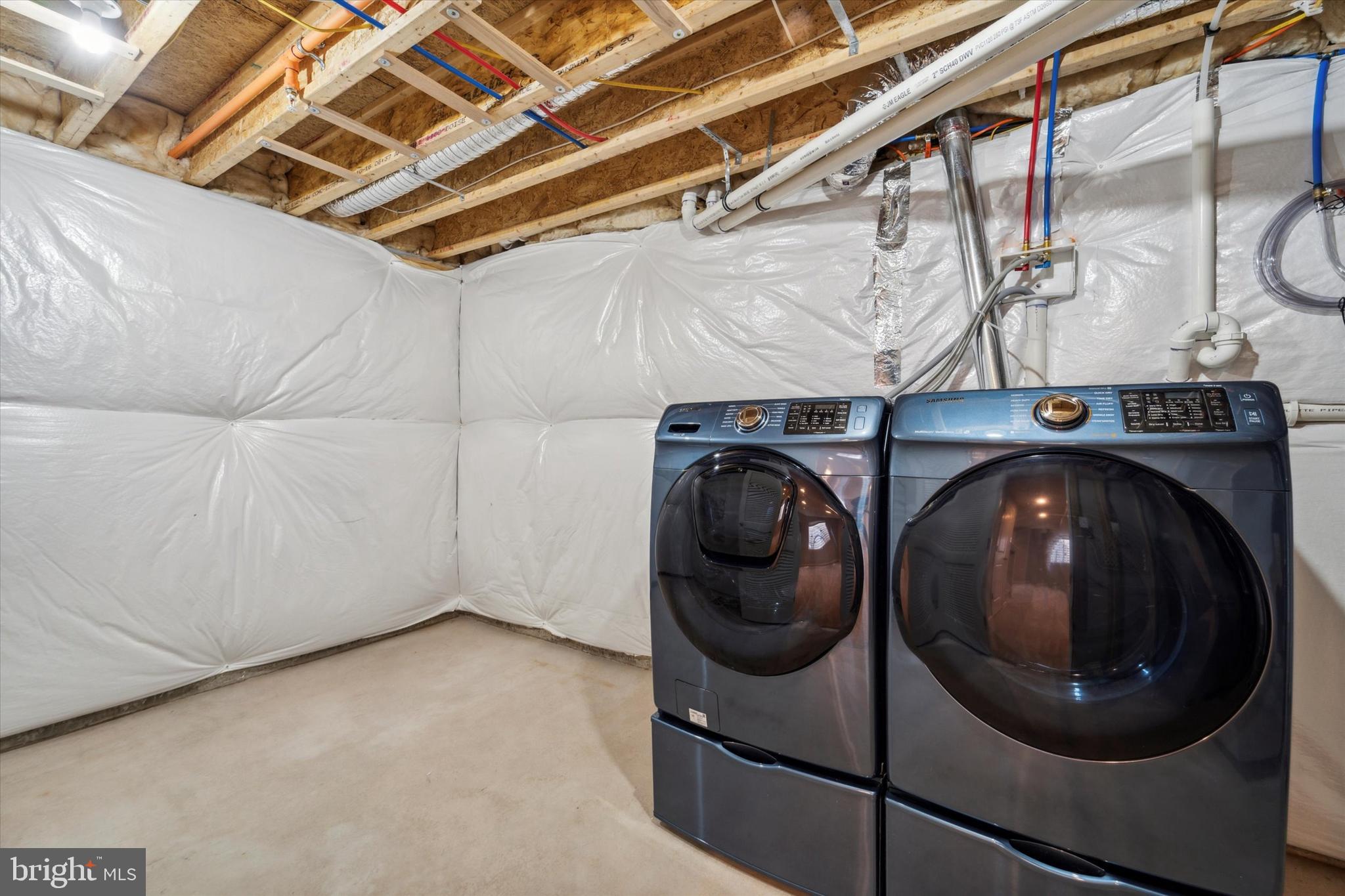 3799 Jacob Stout Road, Unit 5 Doylestown, PA 18902 - Photo 21 of 25 a utility room with dryer and washer