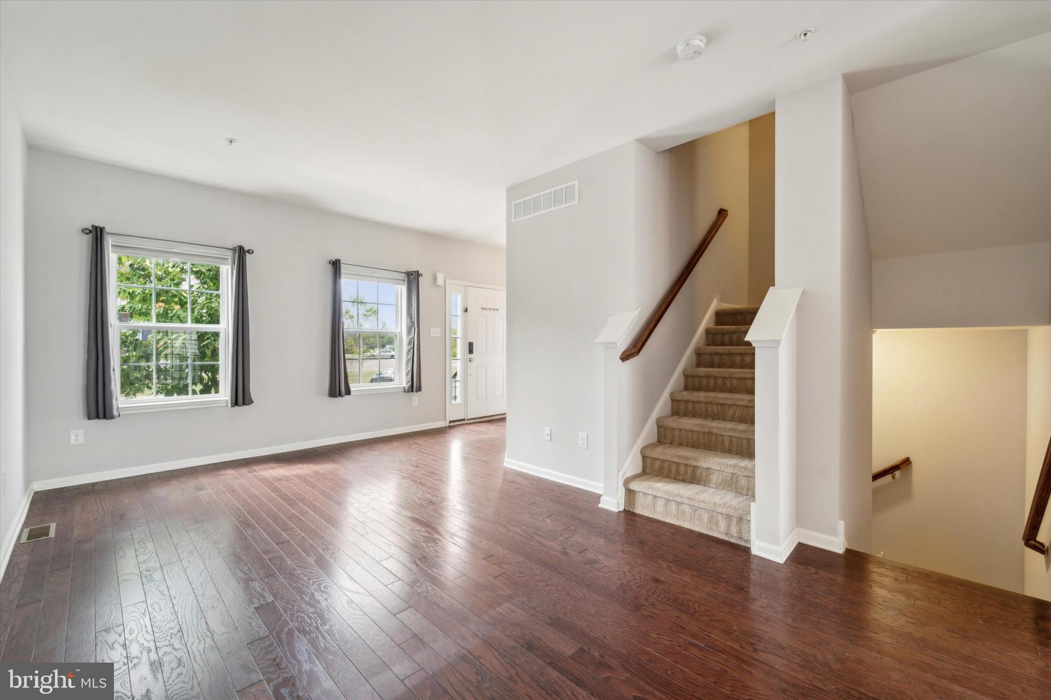 3799 Jacob Stout Road, Unit 5 Doylestown, PA 18902 - Photo 6 of 25 a view of an entryway with wooden floor and stairs