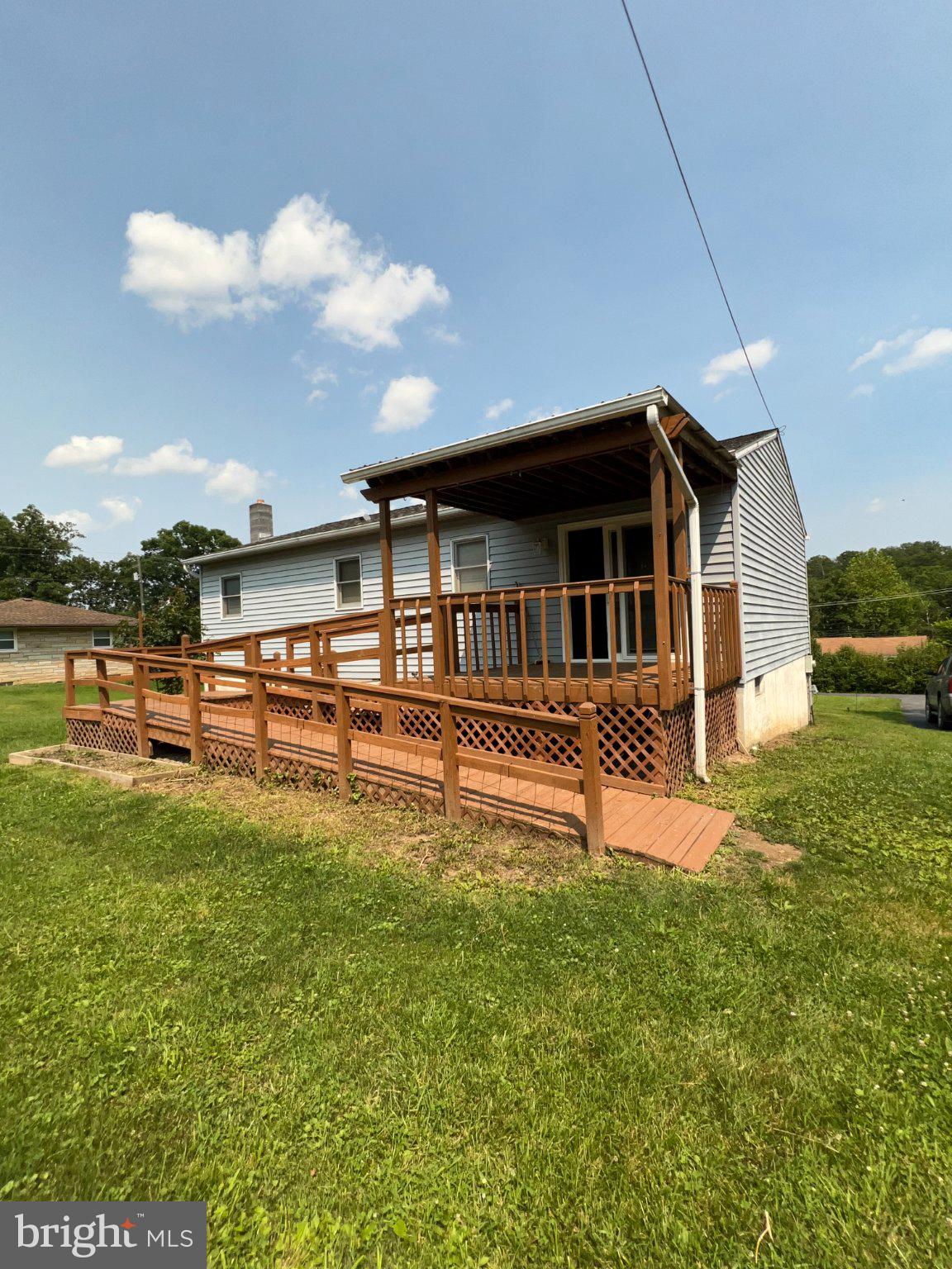 Charming home with inviting deck.