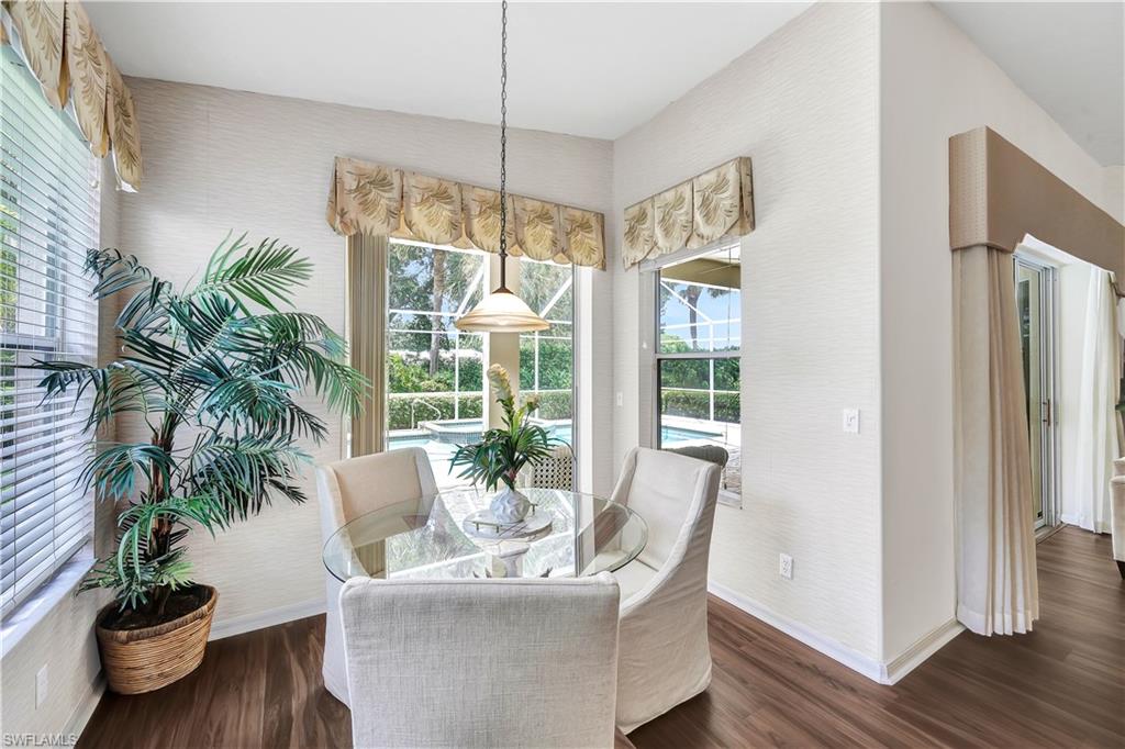1721 Marsh Run Naples, FL 34109 - Photo 16 of 35 a living room with furniture and a potted plant