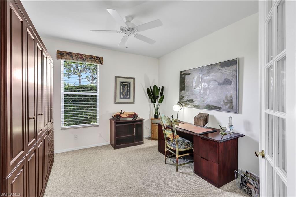 1721 Marsh Run Naples, FL 34109 - Photo 27 of 35 a living room with furniture and a window