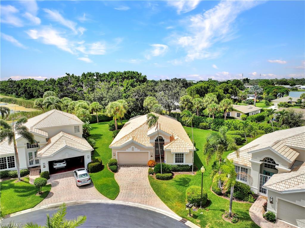 1721 Marsh Run Naples, FL 34109 - Photo 30 of 35 an aerial view of a house with a garden
