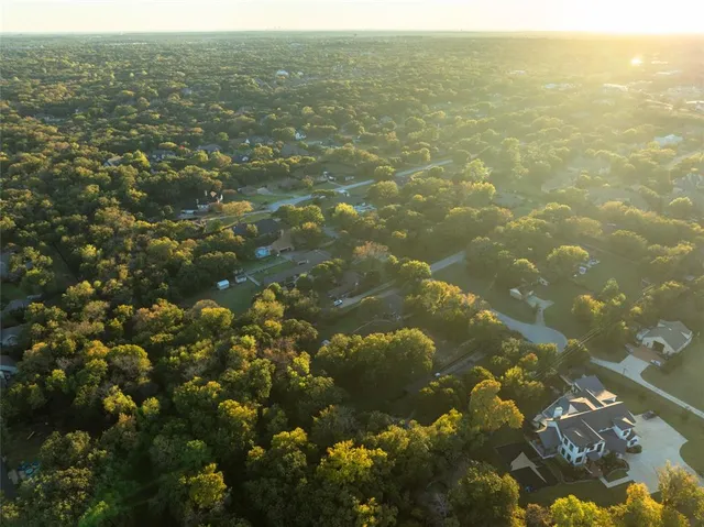 a view of a garden with a lake