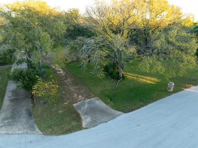 a view of a lake from a yard