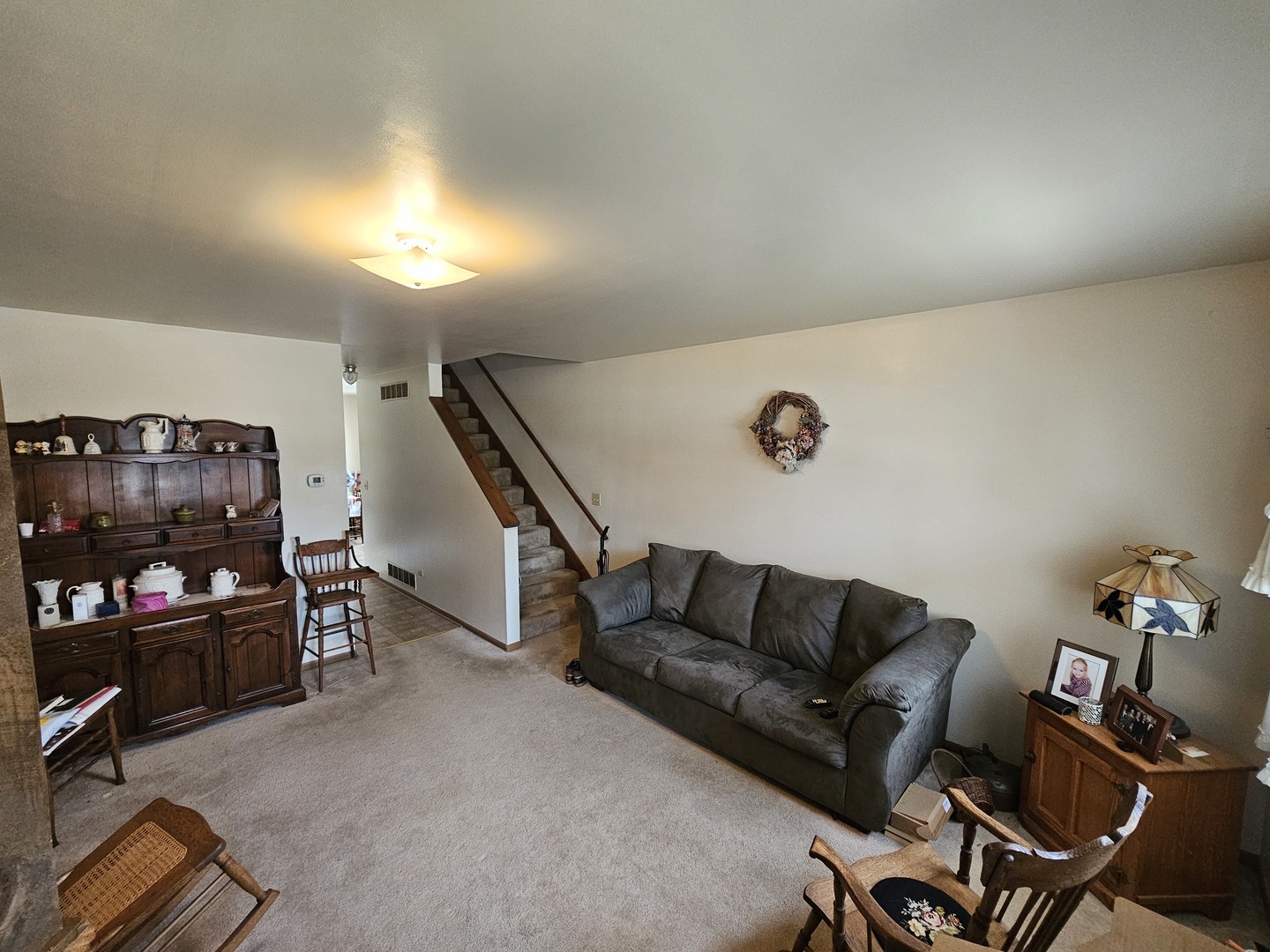 847-849 Rhodes Street Woodstock, IL 60098 - Photo 11 of 44 a living room with furniture and a flat screen tv