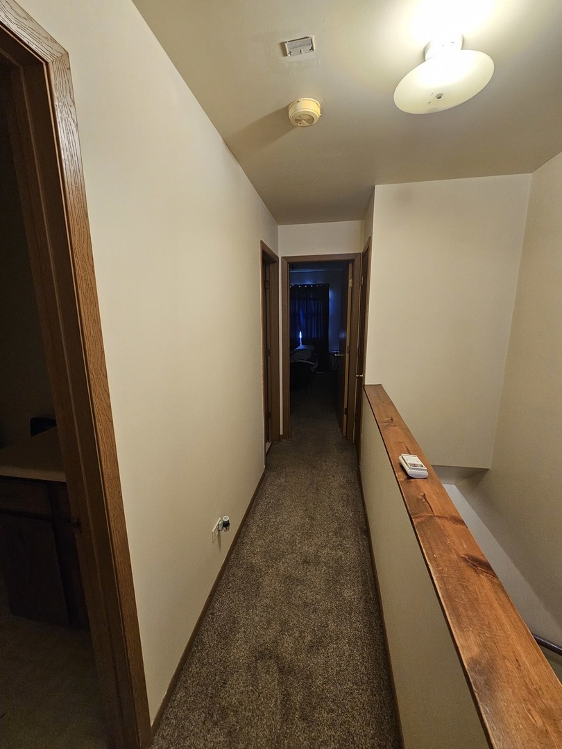 847-849 Rhodes Street Woodstock, IL 60098 - Photo 16 of 44 a view of hallway with stairs