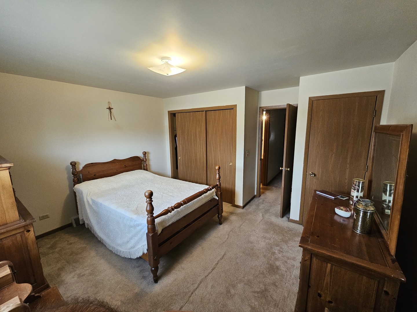 847-849 Rhodes Street Woodstock, IL 60098 - Photo 25 of 44 a bed room with a bed and furniture