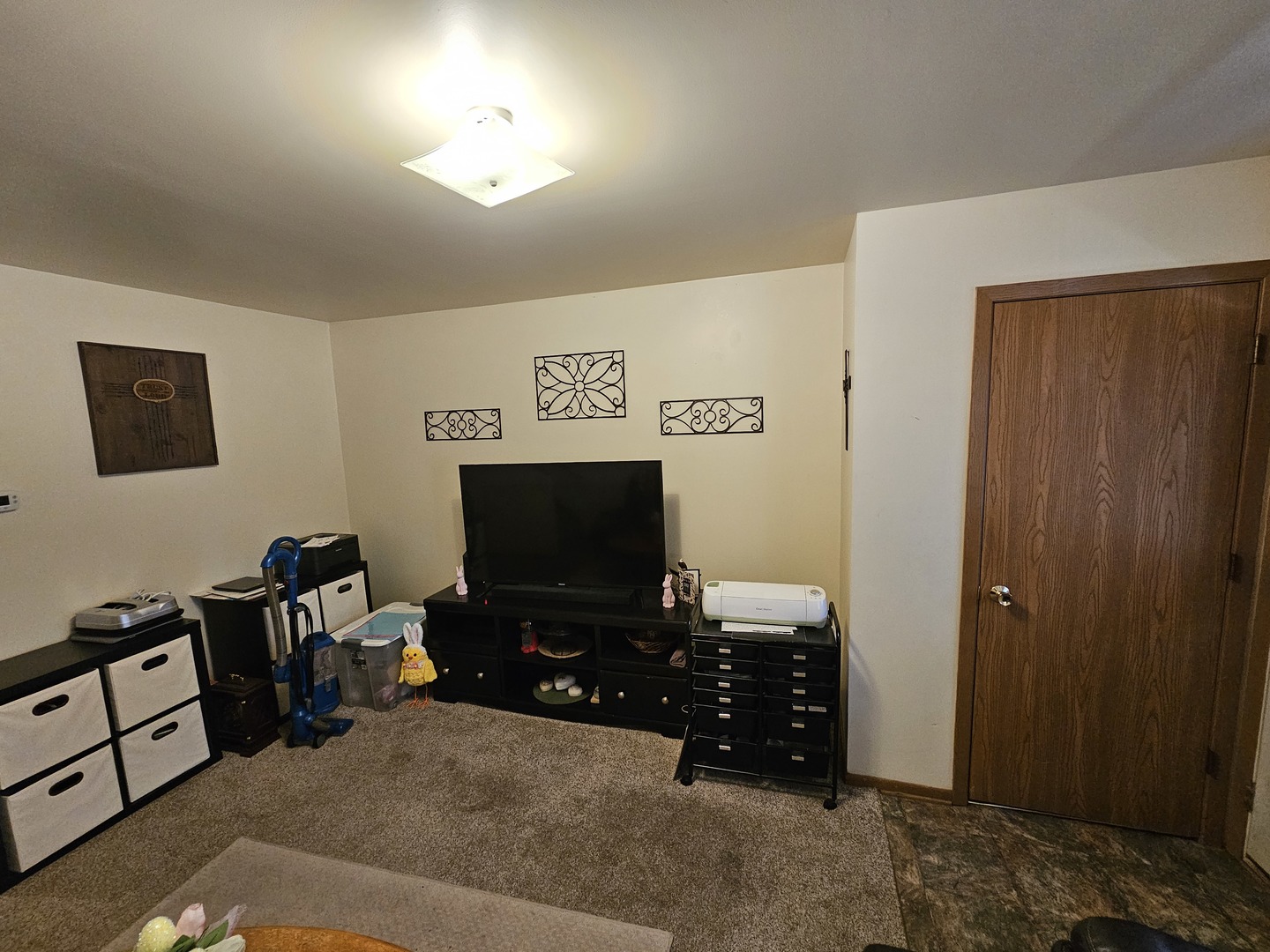 847-849 Rhodes Street Woodstock, IL 60098 - Photo 26 of 44 a living room with furniture and a flat screen tv