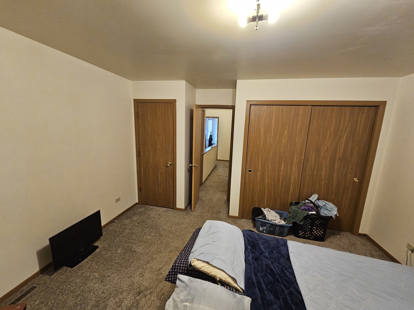 847-849 Rhodes Street Woodstock, IL 60098 - Photo 7 of 44 a bed room with a bed and a couch