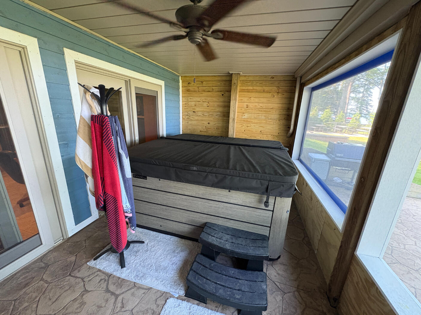 169 Pine Bluffs Road Roscommon, MI 48653 - Photo 33 of 61 Enclosed Porch - Hot Tub