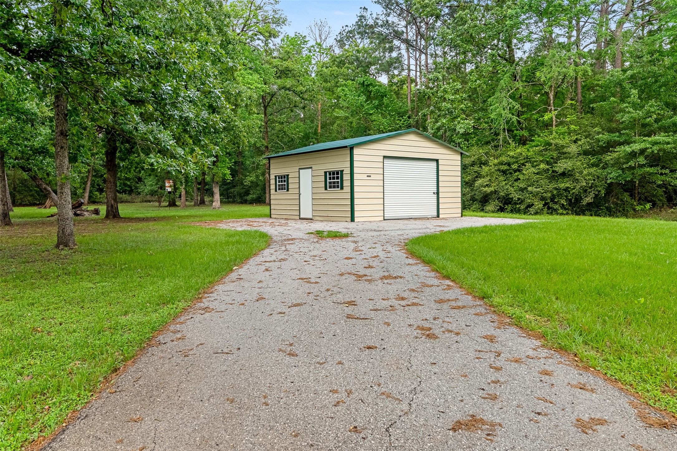 439 Lakeview Harbor Onalaska, TX 77360 - Photo 31 of 43 An extra storage shed sits on the property in the backyard.