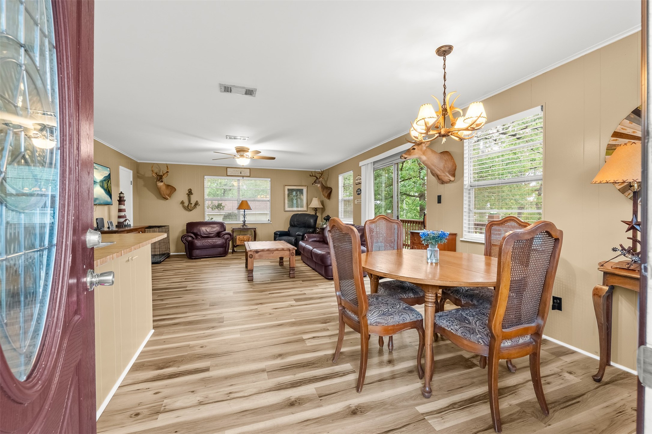 439 Lakeview Harbor Onalaska, TX 77360 - Photo 8 of 43 Immediately after coming inside the home, you will see an open kitchen/ living area.